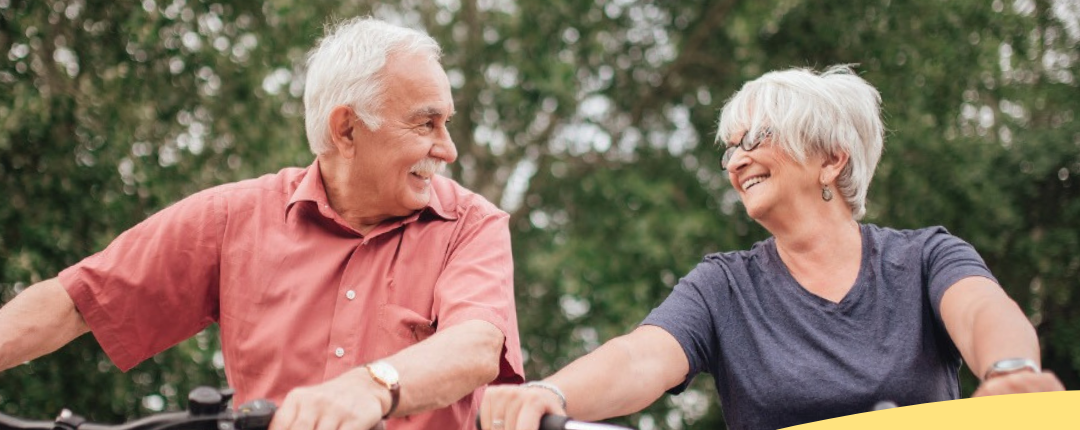 two older people bike riding